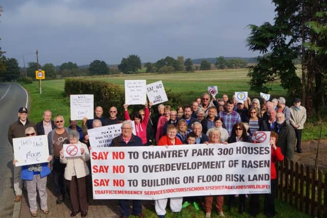 Residents protesting against the Caistor Road development plans EMN-161017-070516001