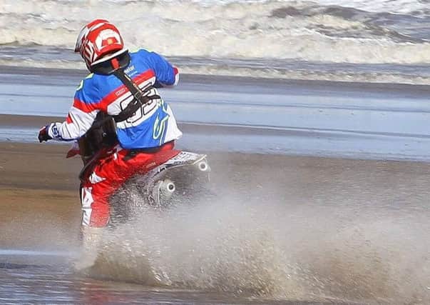 On the beach: Jack Bell won all his races at Mablethorpe despite the bad conditions.