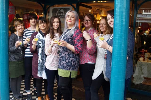 The staff celebrating the opening of White Stuff in Louth.