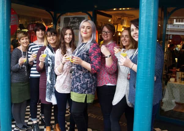 The staff celebrating the opening of White Stuff in Louth.