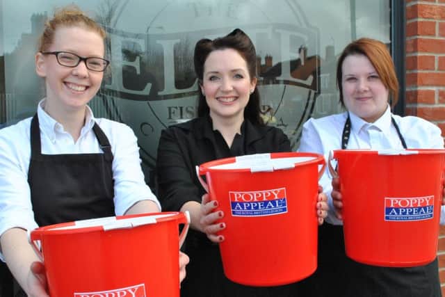 Staff at Elite Fish and Chip Shop Company are pictured with Heather Marie EMN-161019-164958001