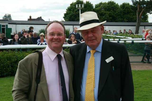 Colin Bud Booth (right) with 2015 Grand National-winning trainer Dr Richard Newland at a Market Rasen meeting in June EMN-160728-090324002