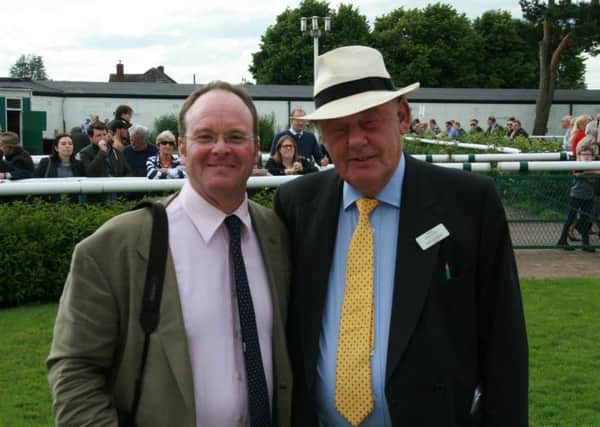 Colin Bud Booth (right) with 2015 Grand National-winning trainer Dr Richard Newland at a Market Rasen meeting in June EMN-160728-090324002