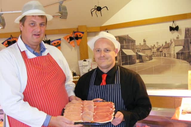 Champions with their home reared smoked bacon. From left - Roy Odling and Jon Parker. EMN-161020-163834001