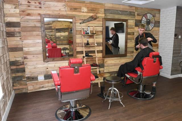 New salon/barber shop on Pen Street, Boston. EMN-161021-112026001
