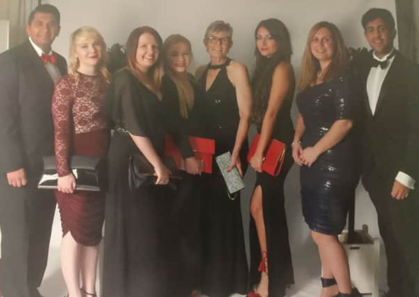 The Specsavers team at the Boston Ophthalmology Charity Eye Ball, (from left) Nitul Prajapati, Sophie Newton, Laura Knox, Nina Truepenny, Joanne Curtis, Rose Parathyra, Amy Marshall, and Sam Hussain. EMN-161026-151652001