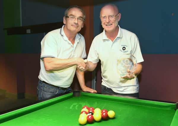 Sleaford and District Pool League presentations. L-R Chairman Paul Whitaker presenting a gift to Andy Brett who is retiring as treasurer. Photo: David Dawson