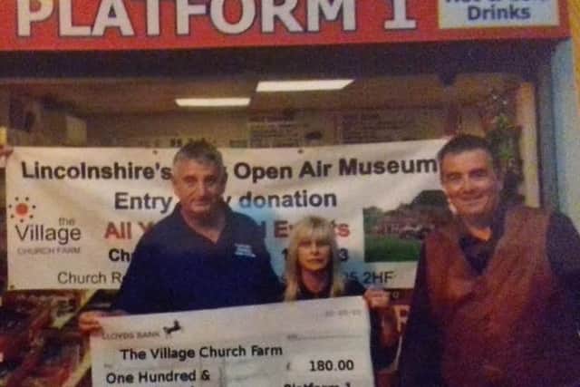Donation of £180 to the Village Church Farm in Skegness by Paul Martin, owner of the Platform 1 café at Skegness Railway Station. EMN-161027-171046001