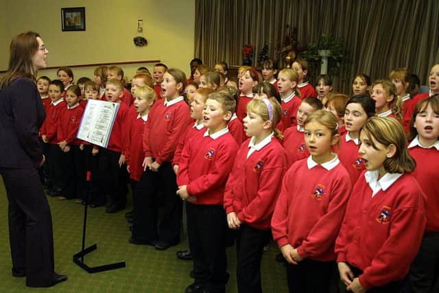 Pupils at Skegness Junior School in December 2003 with their choral roadshow.