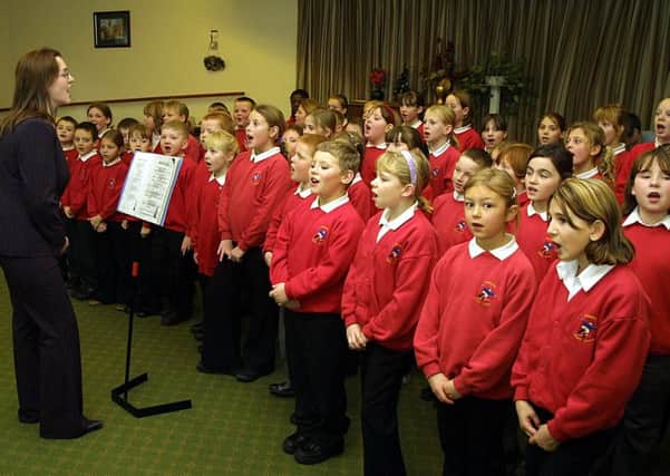 Pupils at Skegness Junior School in December 2003 with their choral roadshow.
