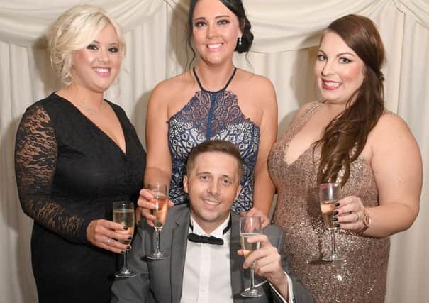 Black-tie event in aid of James Thorpe at Haven High Academy. James Thorpe pictured with L-R Holly Watson - sister-in-law (organiser), Michaela Watson - fiancee, Ashley Harrison (organiser). EMN-161031-103835001