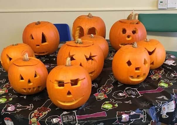Patients from Pilgrim Hospital have been carving pumpkins.