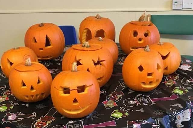 Patients from Pilgrim Hospital have been carving pumpkins.