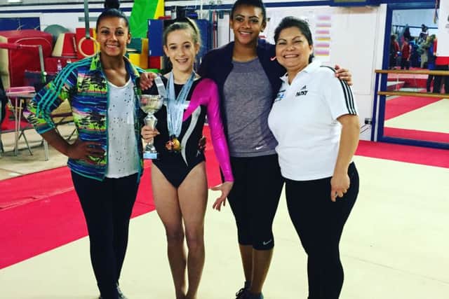 Double Downies Cup winner and 2016 champion Kloe Neil-Morrice is pictured with Sleaford Elite head coach Patsy Shields and Olympian sisters Ellie and Becky Downie.