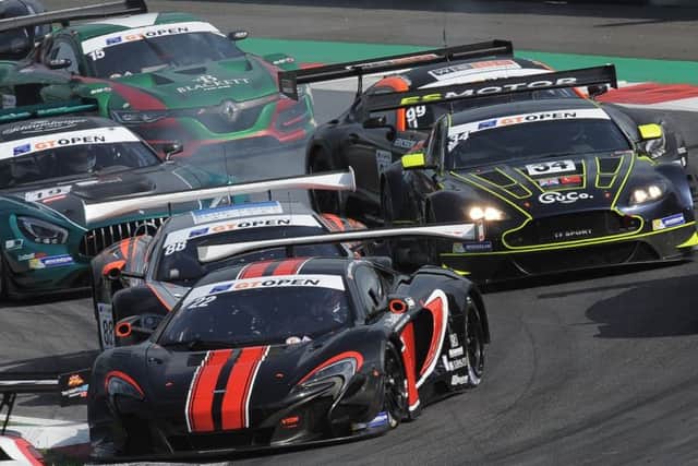 Shaun Balfe's McLaren leads the way.