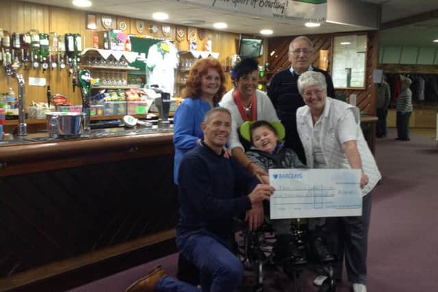 The cheque is handed over.