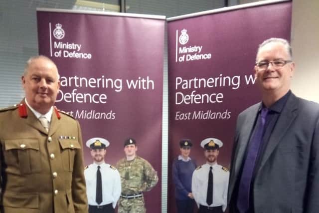 Colonel Niall MacDougal with Chair Paul Devlin EMN-160111-172334001