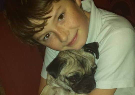 Vera Smyth's son Jack, 11, reunited with Puggy. EMN-160211-155310001