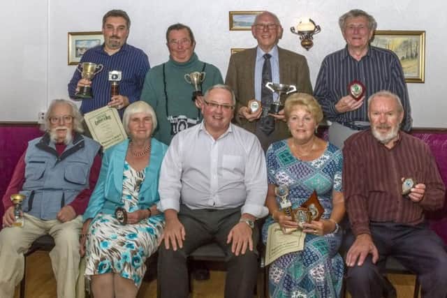 Award winners at the H&DPS Dinner take a photo call. Back L-R;- Markus Hoppe, Brian Pinnion, Ron Abbott and Richard Brown. Front:- Oscar Smedley, Jane Lawrence, Guest of Honour Martin Joy, Sandra Todd and Bob Dowlman. Photo by Oscarpix Imaging. EMN-160311-172434001