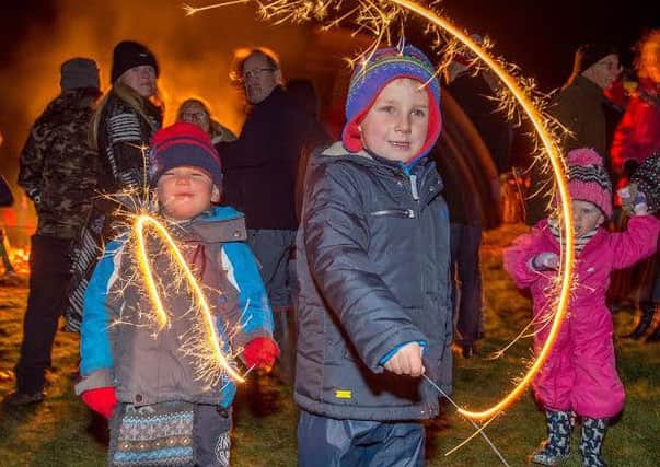 Lots of sparkle: George Carr  (age 4) and Edward Ellershaw (age 4) enjoy the fun,at the  Langton Hill event.