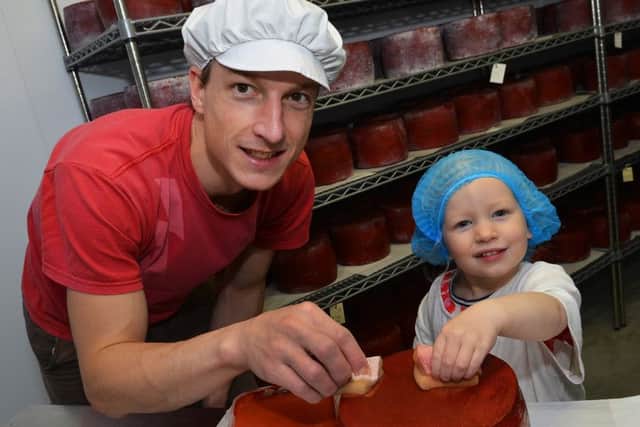 Edith with her dad Joe at work in the cheeseroom at Cote Hill Farm EMN-161113-201939001
