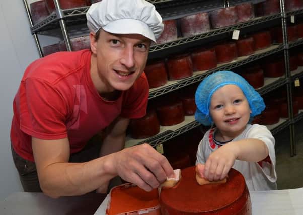 Edith with her dad Joe at work in the cheeseroom at Cote Hill Farm EMN-161113-201939001