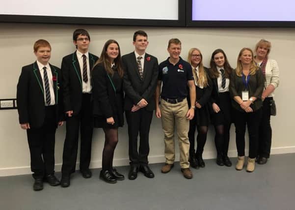 Students from Caistor Yarborough Academy with astronaut Tim Peake EMN-161111-200639001