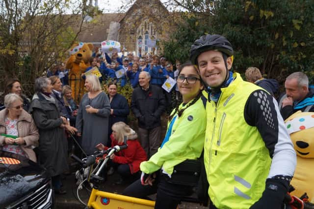 One Show presenterb Matt Baker and Team Richshaw cyclist Ebony got a rousing welcome when they stopped off at Tealby on Day 5 of their challenge. EMN-161115-125320001