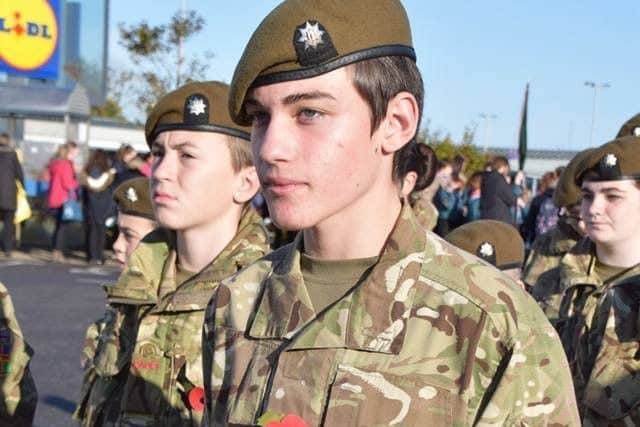 Henry Hyde with the Skegness detachment of the Army Cadets who took part in the town's Remembrance Day parade. Photo: Barry Robinson. ANL-161114-125952001