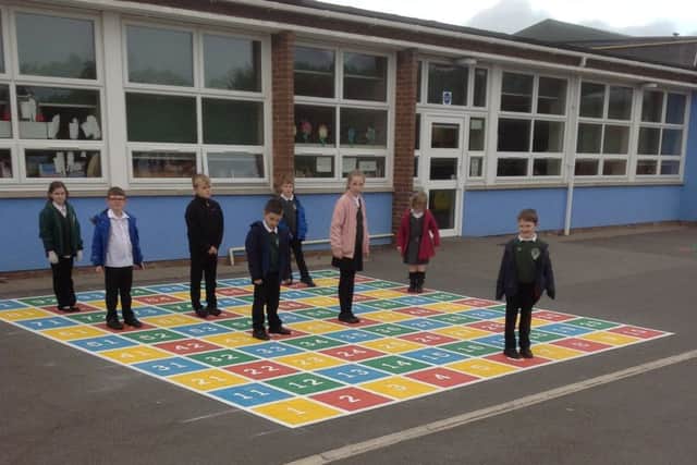 Seathorne Primary School pupils enjoying their new playground EMN-161111-162552001