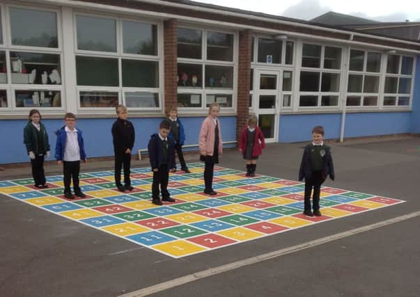 Seathorne Primary School pupils enjoying their new playground EMN-161111-162552001