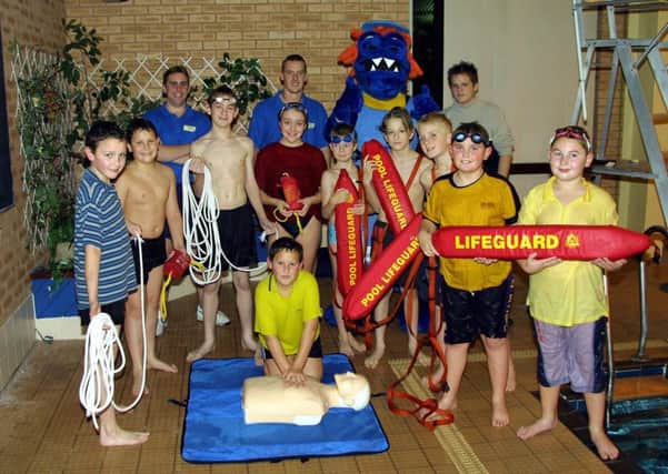 Rookie lifeguards at the Skegness Embassy swimming pool back in December 2003, with instructors Mark Barnsley, Leigh Morley, and Luke Rawlings (in the AL the Alligator suit) plus young Adam Whenman doing a spot of CPR work. EMN-160911-152652001