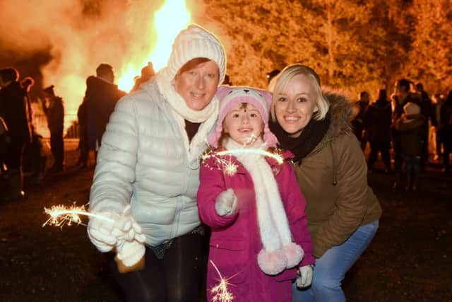 Boston Town fireworks display. L-R Alson Elding, Fraya Abbott 5, Annabel Abbott. EMN-160611-115025001