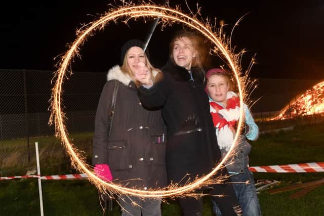 Sleaford Rugby Rugby Club fireworks display. L-R Emily Spybey, Danielle Moon and Amber Whittley 10.