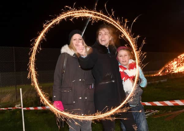 Sleaford Rugby Rugby Club fireworks display. L-R Emily Spybey, Danielle Moon and Amber Whittley 10.