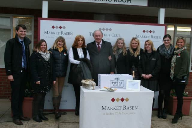 Racecourse chairman Colin Booth with his brilliant team at Market Rasen EMN-160711-093141002
