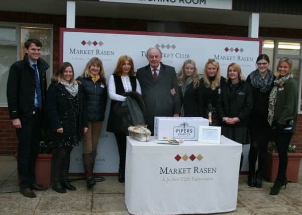 Racecourse chairman Colin Booth with his brilliant team at Market Rasen EMN-160711-093141002