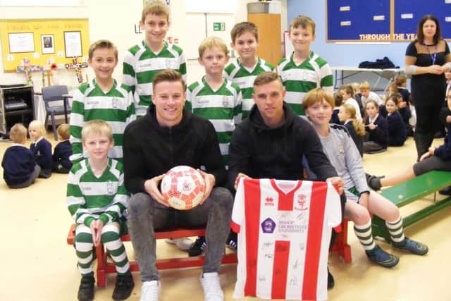 City stars Paul Farman and Jack Muldoon with Digby School players. EMN-161114-134005001