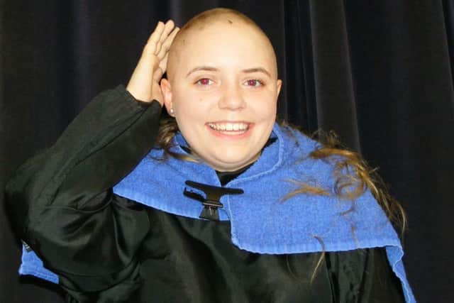 Head shave - Kesteven and Sleaford High School student Rosie Devos, 16. EMN-161114-142612001
