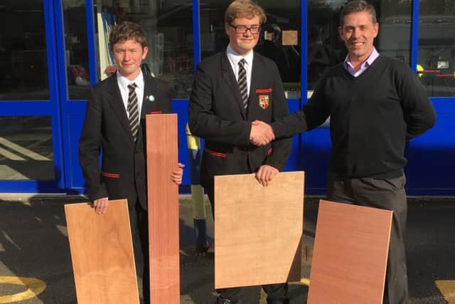 Left Seth Parrott, Jack Dawson and Martin Crosthwaite, assistant branch manager at Turnbull Building and Plumbing Supplies EMN-161011-160715001