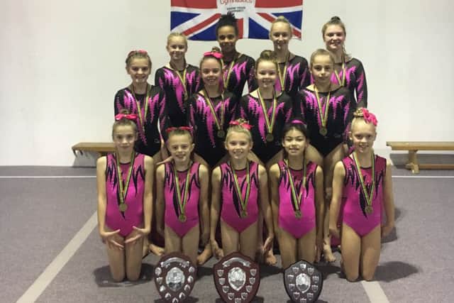 The successful gymnasts.