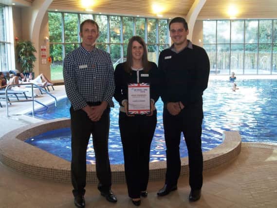 ClubSpa manager Richard Arnold, general manager Gemma Leafe and membership advisor Marcus Walmsley stand proudly with their national award.