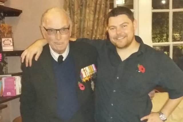 Former Desert Rat 91-year old Alec Gurney proudly displays his medals at the Welcome Inn in Skegness with Lee Croft. ANL-161114-110829001
