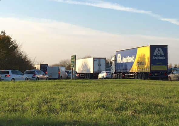 Traffic tailbacks past the A153 East Road junction with the A17 Sleaford bypass this afternoon (Friday). EMN-161111-153006001