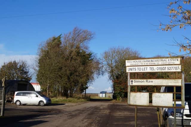 The Red House Farm Industrial Estate. The proposed mast will be built behind the tall trees on the left hand side.