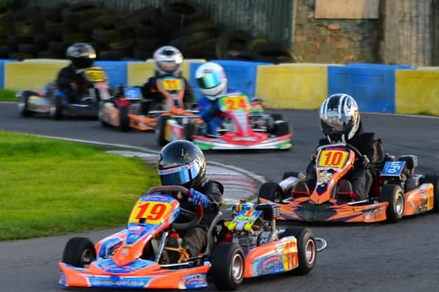 Cadwells Liam Hartley (19) leads the Hondas ahead of Demi-Leigh Belt (10) and Brooke Lees (24) EMN-161114-101152002