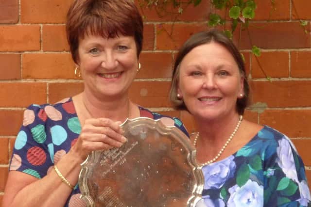 Kenwick Park's new lady captain Andrea Smaggasgale (left) with out-going skipper Penny Buckley EMN-161114-114347002