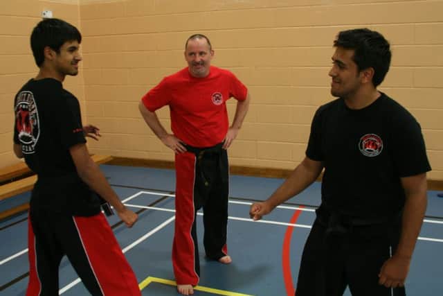 Ben (left) and James have been coached by Gary for about 10 years EMN-161114-131508002