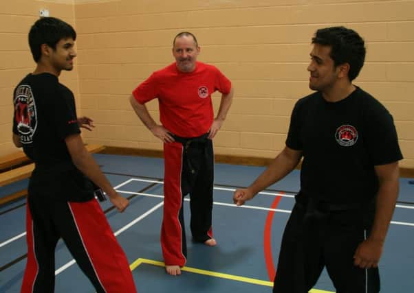 Ben (left) and James have been coached by Gary for about 10 years EMN-161114-131508002