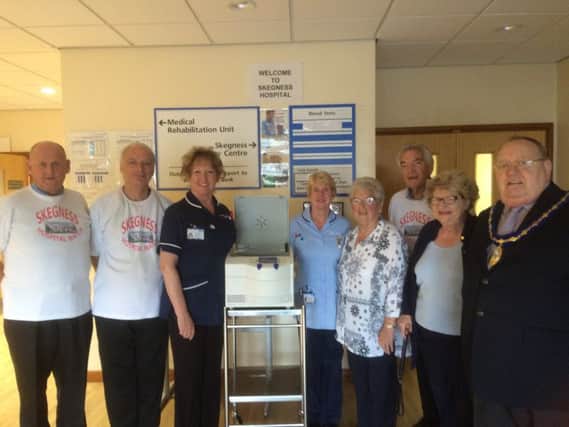 Sister Victoria Wilson, Phlebotomist Beverley Haywood, Mrs Vincent (mother of Bill), Chairman of Ingoldmells Parish Council Len Hemingway and Skegness Hospital Watch committee members Marigold Chisnall, John Orgine, Eddie Gasson and Geoff Poulter. ANL-161115-104446001